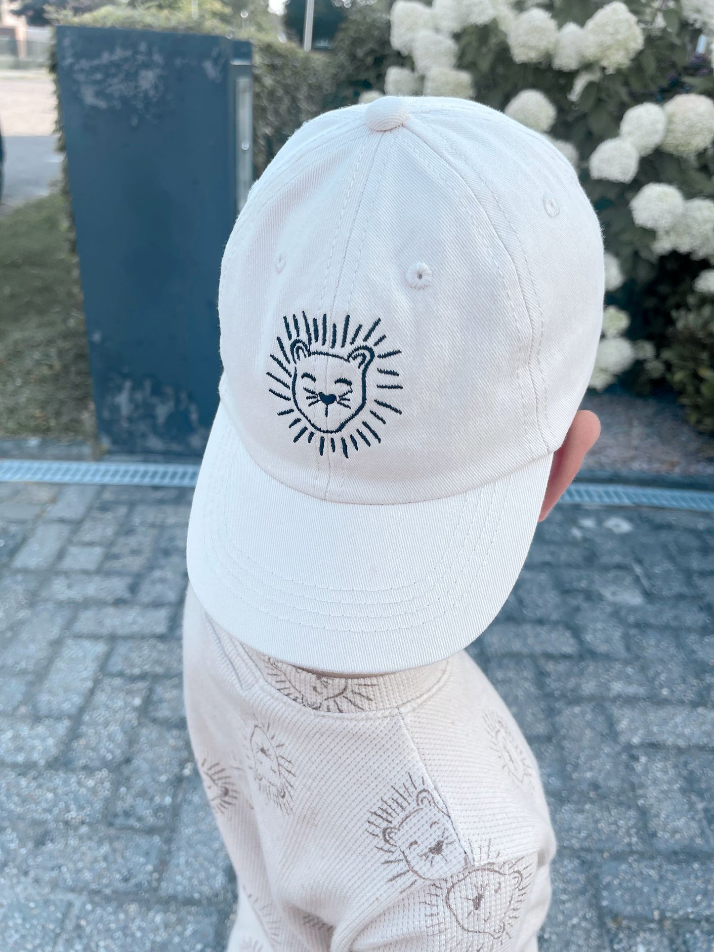 Babykleding - Pet/Cap Lenn Lion logo Beige