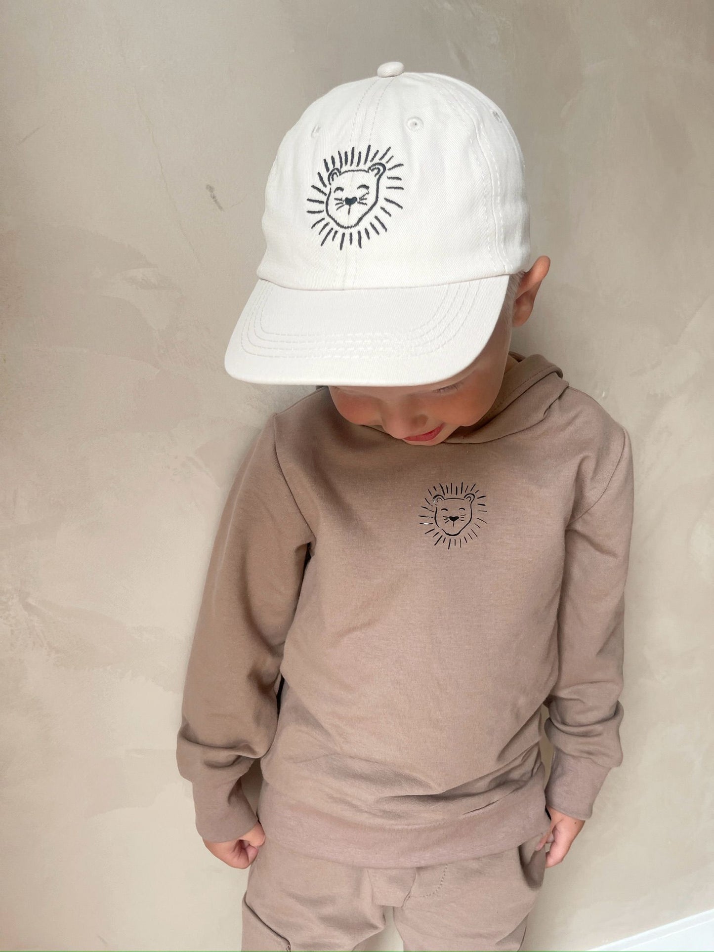 Babykleding - Pet/Cap Lenn Lion logo Beige
