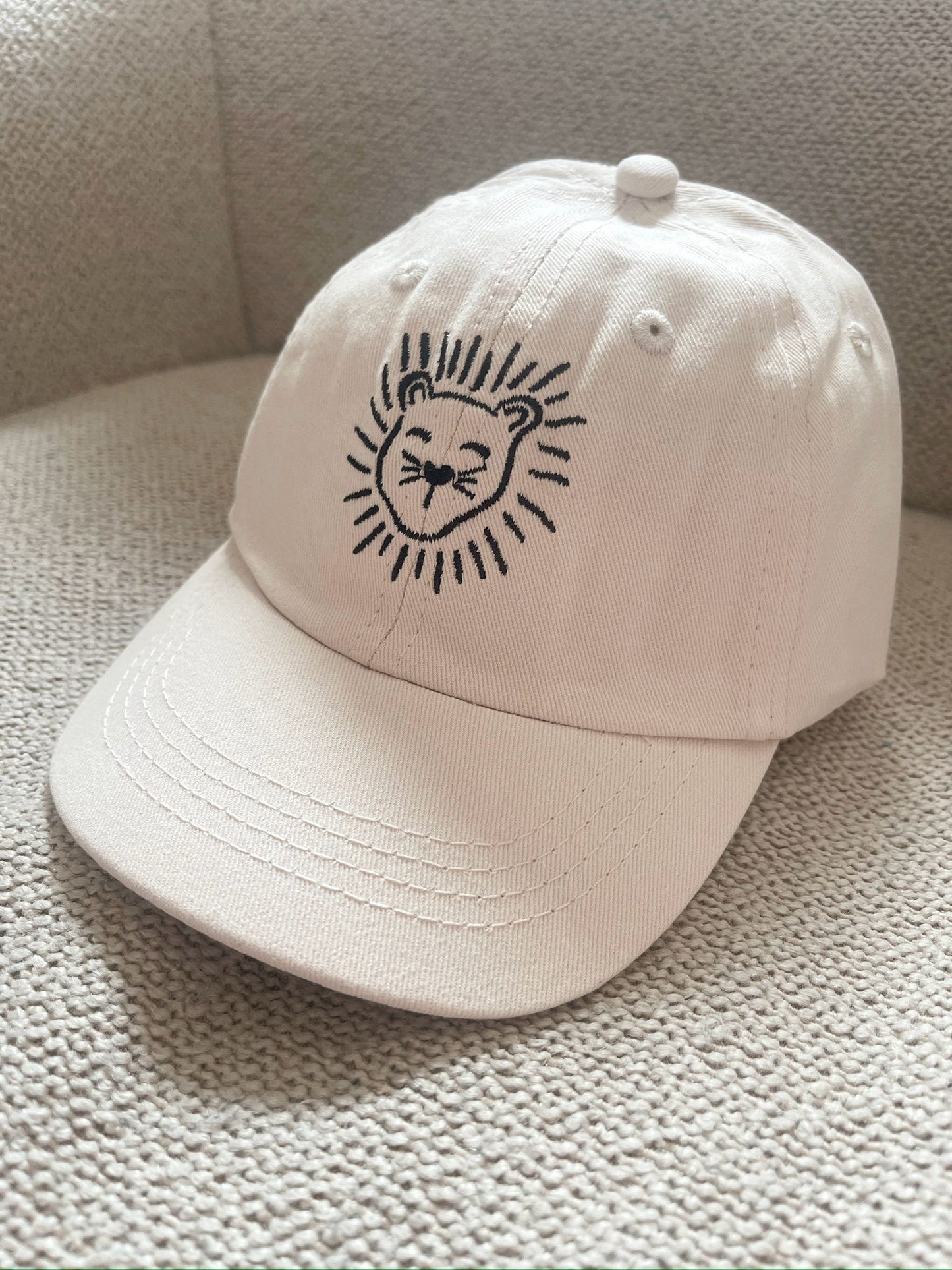 Babykleding - Pet/Cap Lenn Lion logo Beige